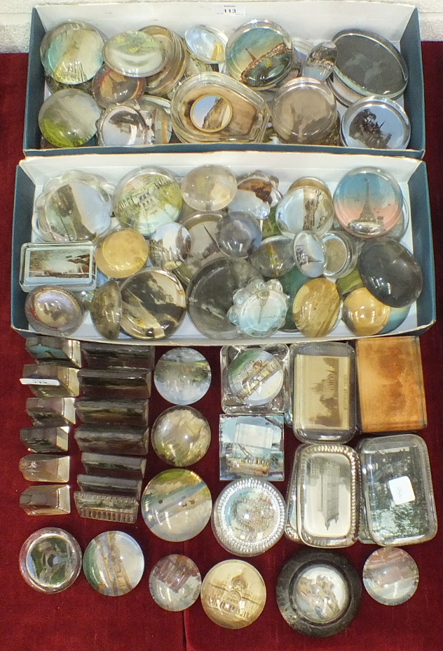 A large group of 19th and 20th century glass souvenir paperweights, approximately 100.
