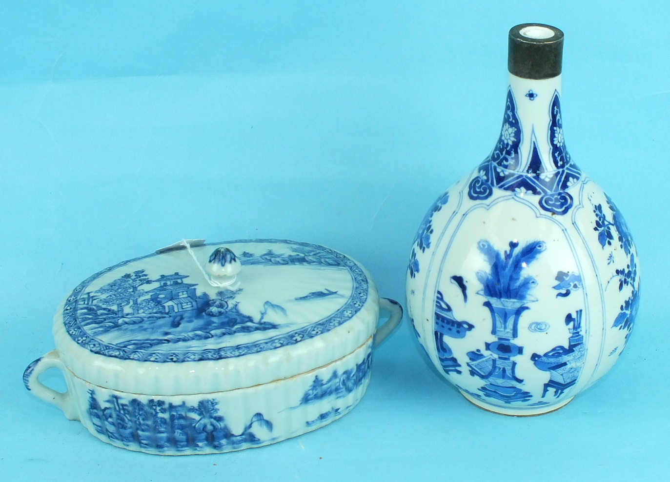 An 18th century Chinese porcelain blue and white oval bowl and cover decorated with landscapes, (