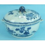 An 18th century Chinese porcelain circular tureen and cover decorated with landscapes, with shell