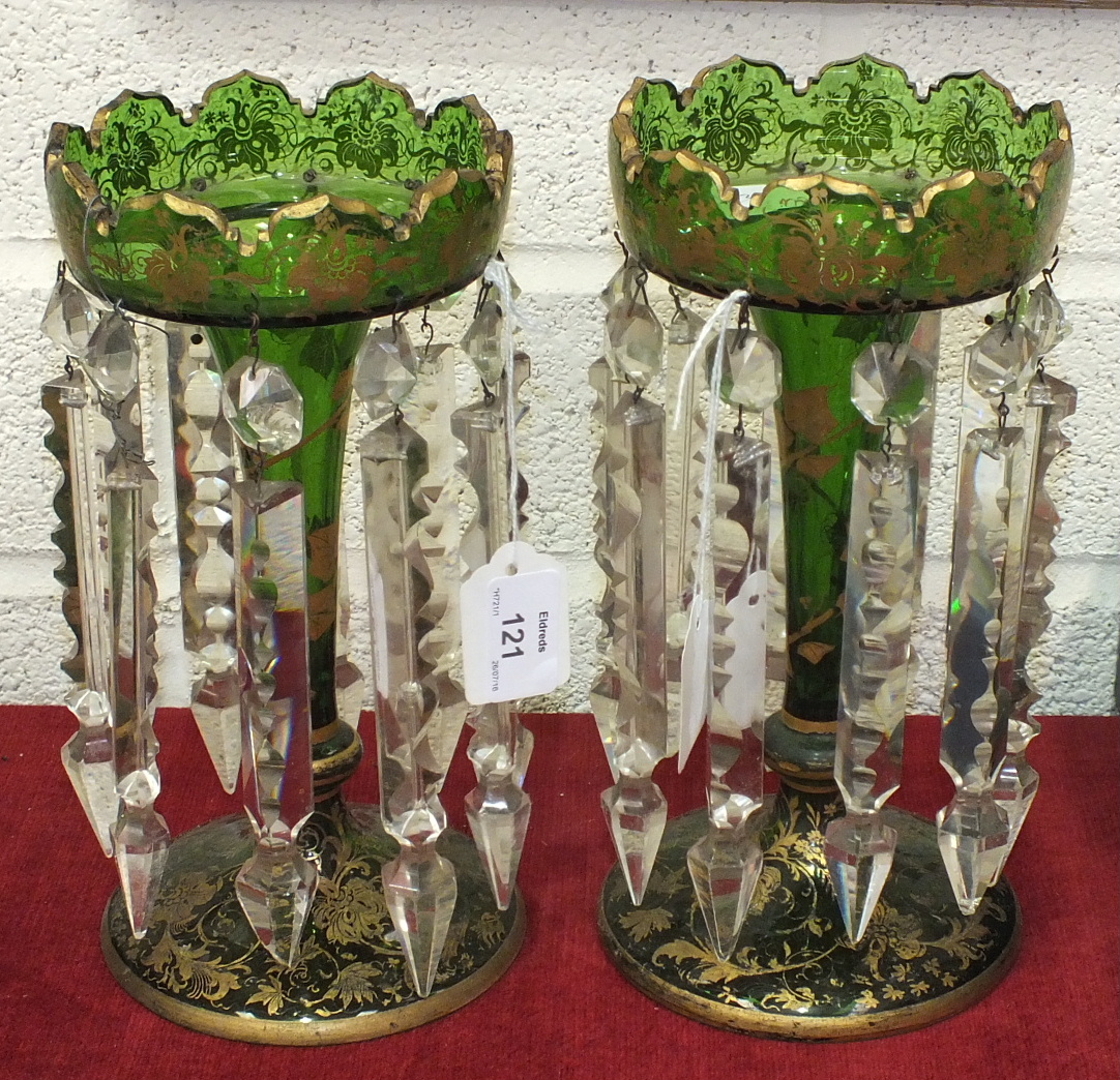 A pair of 19th century green and gilt glass lustres with ivy leaf and floral gilding and each with