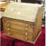 A collectors' chest in the form of a small pine bureau, the fall front above four long drawers, 44.