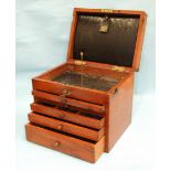 A similar dentist's cabinet, the lift lid with leather wallet marked 'Cash, Sons & Co, London',