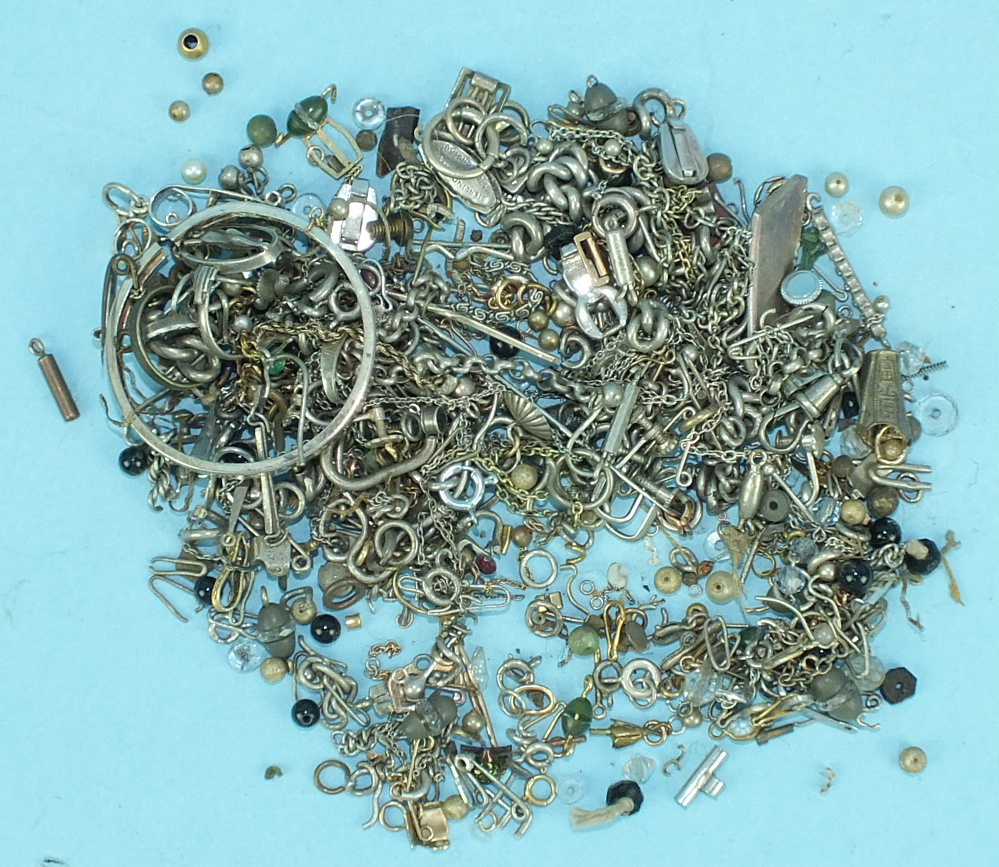 A quantity of mainly silver and white metal chains, clasps, etc. and other items.