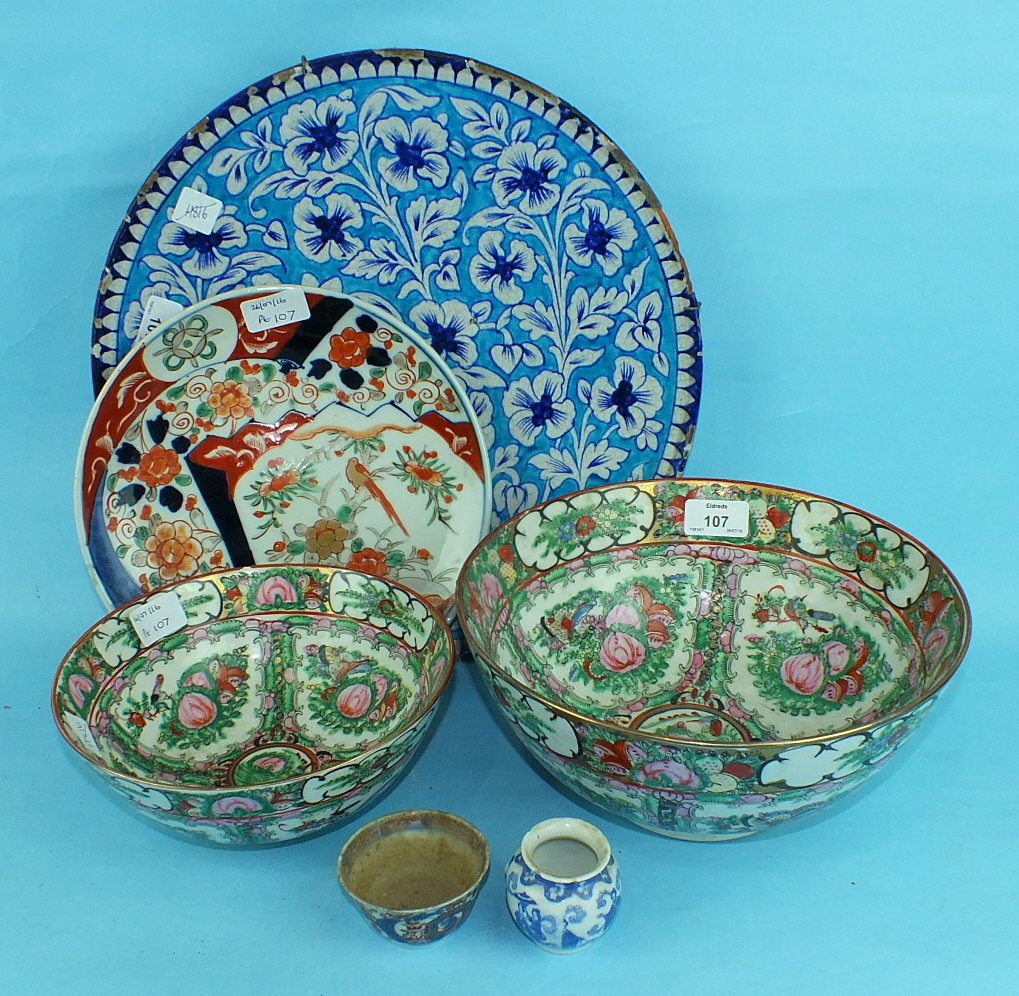 A 19th century Iznik dish, an Imari dish and other Oriental ceramics, (6 pieces).