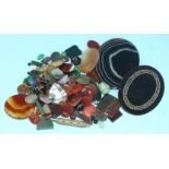 A large oval banded agate plaque, 85 x 63mm, a large rock crystal seal, a quantity of hardstone