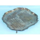 A silver square Chippendale-style salver of four hoofed feet, 35.5cm, engraved inscription to top,