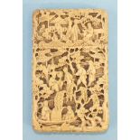 A 19th century Chinese ivory card case deeply-carved with figures in rural pursuits and garden