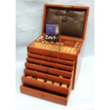 A 19th century mahogany dentist's cabinet, the lift lid and fitted interior above six drawers