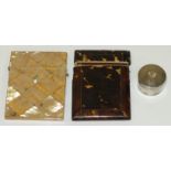 A mother-of-pearl card case, (a/f), a tortoiseshell card case, (a/f) and a circular silver pill box,