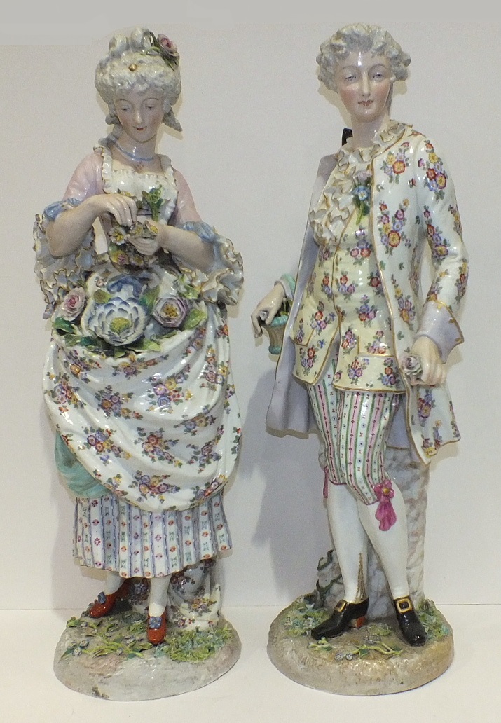 A large pair of 19th century Continental Meissen-style porcelain figures of a gallant and his