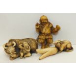 A 19th century Japanese ivory netsuke of a boy and a buffalo, (tail damaged), another of a rat