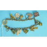 A 9ct yellow gold bracelet with fourteen charms, 35g.