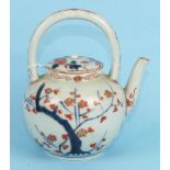 An 18th century Japanese Arita porcelain teapot and cover with loop handle, decorated in Imari