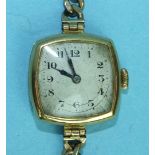 A ladies 18ct-gold-cased Centaur wrist watch on 9ct gold curb-link bracelet.
