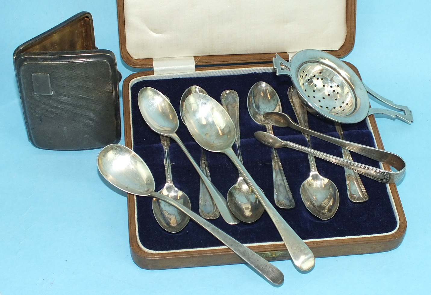 Six cased silver teaspoons, Sheffield 192........., a ladies cigarette case, 8 x 6cm, Chester