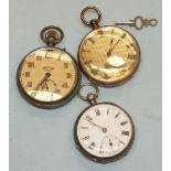 A gold-plated open-face key-wind pocket watch with silver engine-turned dial and two other