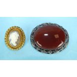A small shell cameo brooch with gilt mount and a silver-mounted agate brooch, (2).