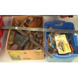 A quantity of wooden planes and other tools.