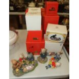 A collection of thirteen Arden Sculptures of Rupert Bear, boxed and other Rupert Bear figures.