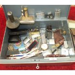 A large collection of fuel lighters, Parker pens and miscellaneous items.