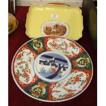 A late German 'Meissen' cabaret tray painted with a rural scene, on yellow ground, 28cm, three