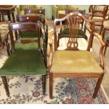 A Hepplewhite-style 19th century mahogany carver chair, a set of four Georgian mahogany dining