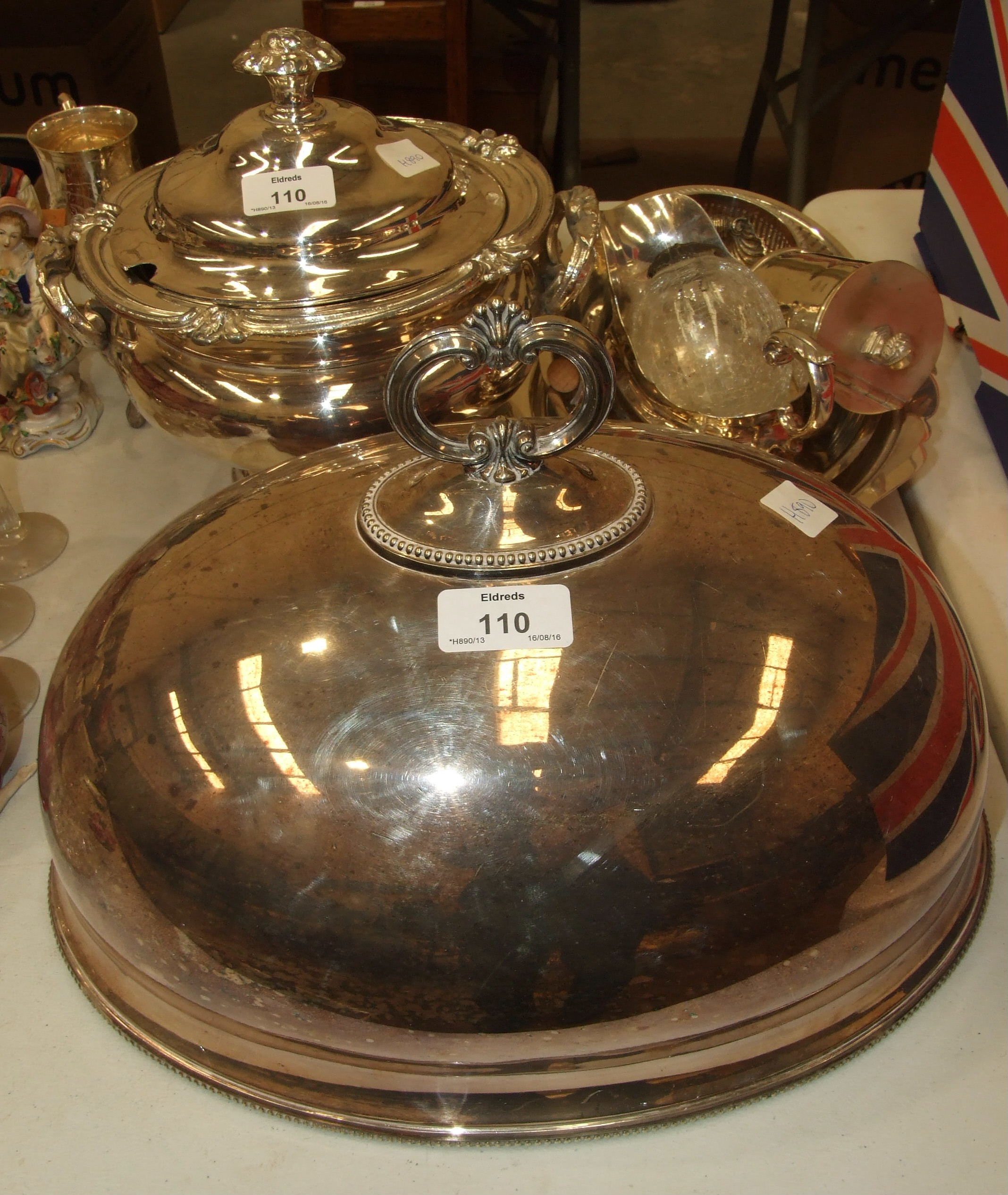 A 19th century plated tureen and cover, a plated food dome, 36cm long, 25cm high, including handle