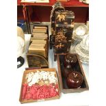 Various Oriental ivory chess pieces, a lacquered book stand and other items.