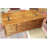 A modern hardwood coffee table/storage box fitted with drawers, 118cm x 66cm, 40cm high.