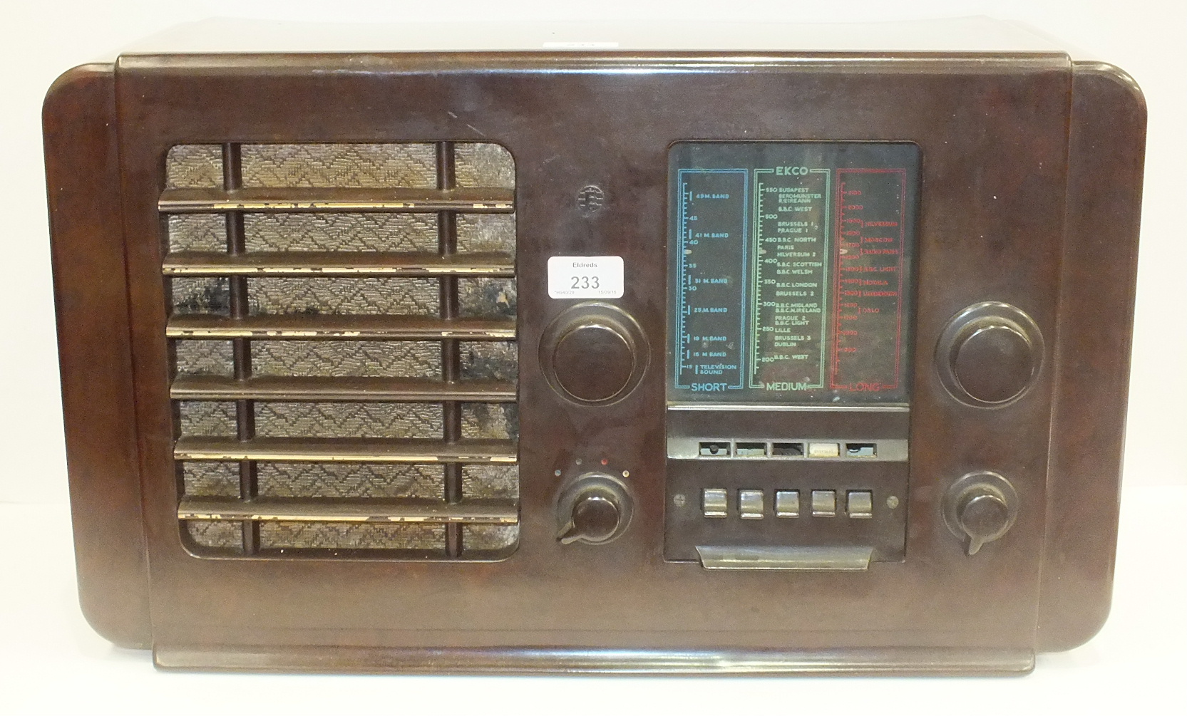 An early-20th century Ekco type A23 Receiver Bakelite-cased valve radio, 57.5cm wide.