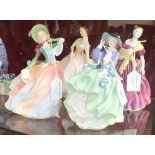 Four Royal Doulton figurines, 'Autumn Breezes' HN1911, 20cm, 'Adrienne' HN2152, 20cm, 'The Polka'