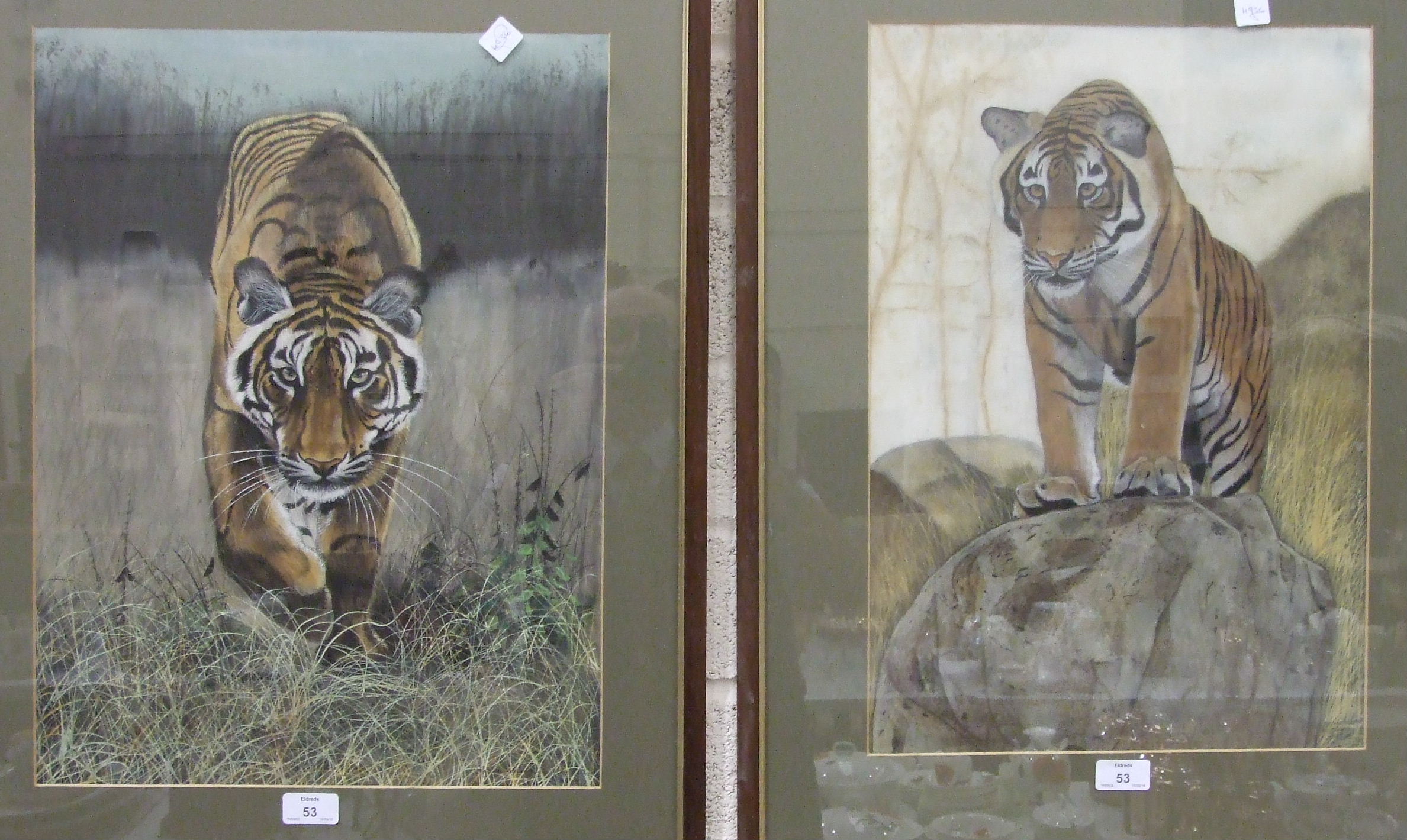 The Ranthambore School of Art, 'Tiger walking on grass', indistinctly signed painting on silk, 51.