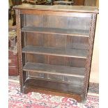 An oak freestanding open bookcase, 91cm wide, 114.5cm high and another smaller similar bookcase,