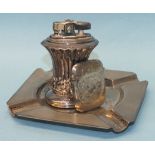 A silver Vesta case with engraved decoration, Birmingham 1914, an engine silver ashtray,