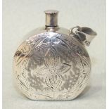 A silver pendant scent bottle of circular form, with engraved decoration, marked '925', 3.5cm