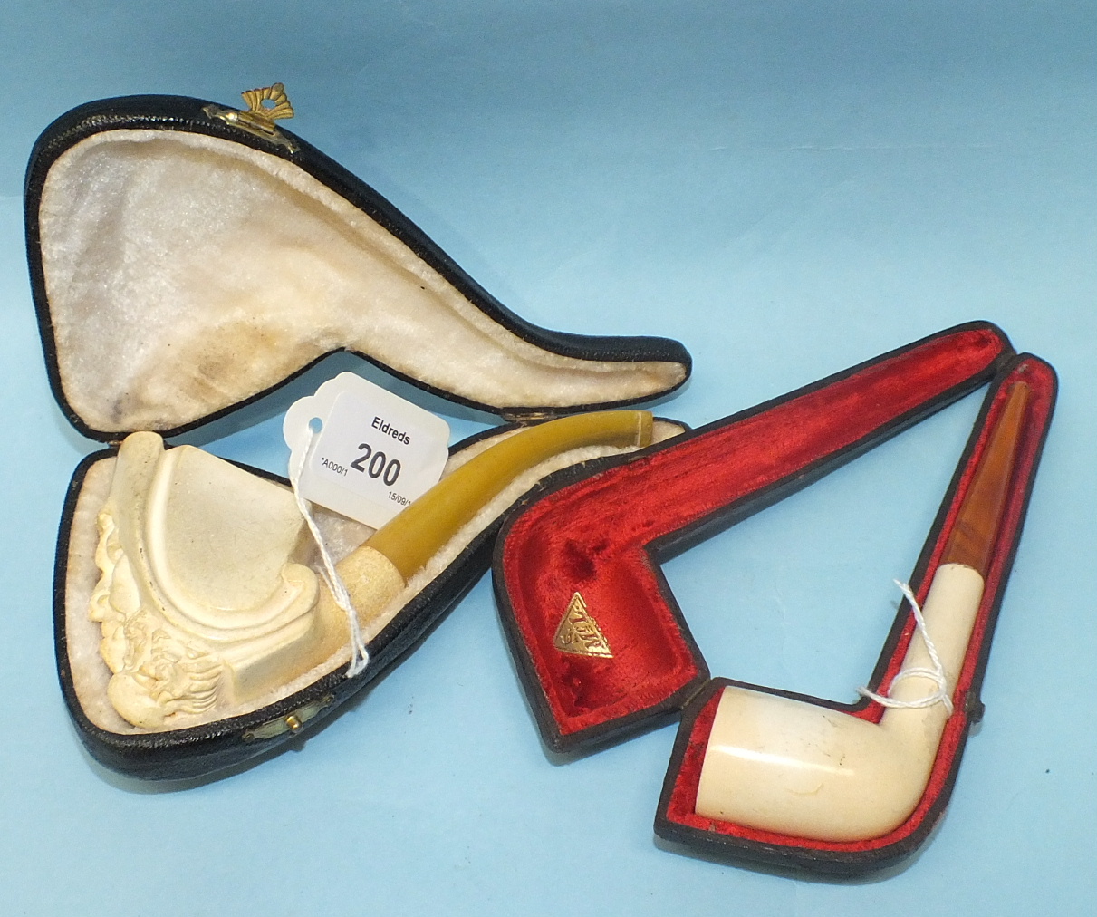 A meerschaum pipe of plain form, in fitted case, marked 'S McL', 15cm and one other, (2).