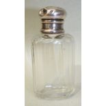 A small silver-topped scent bottle of oval cylindrical form, the lid hallmarked for London 1936, (