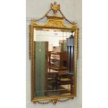 A modern Adam-style gilt wall mirror, 57 x 115cm and two modern rectangular bevelled gilt frame wall