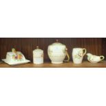 Five pieces of A J Wilkinson Royal Staffordshire pottery with relief-moulded fruit decoration on a