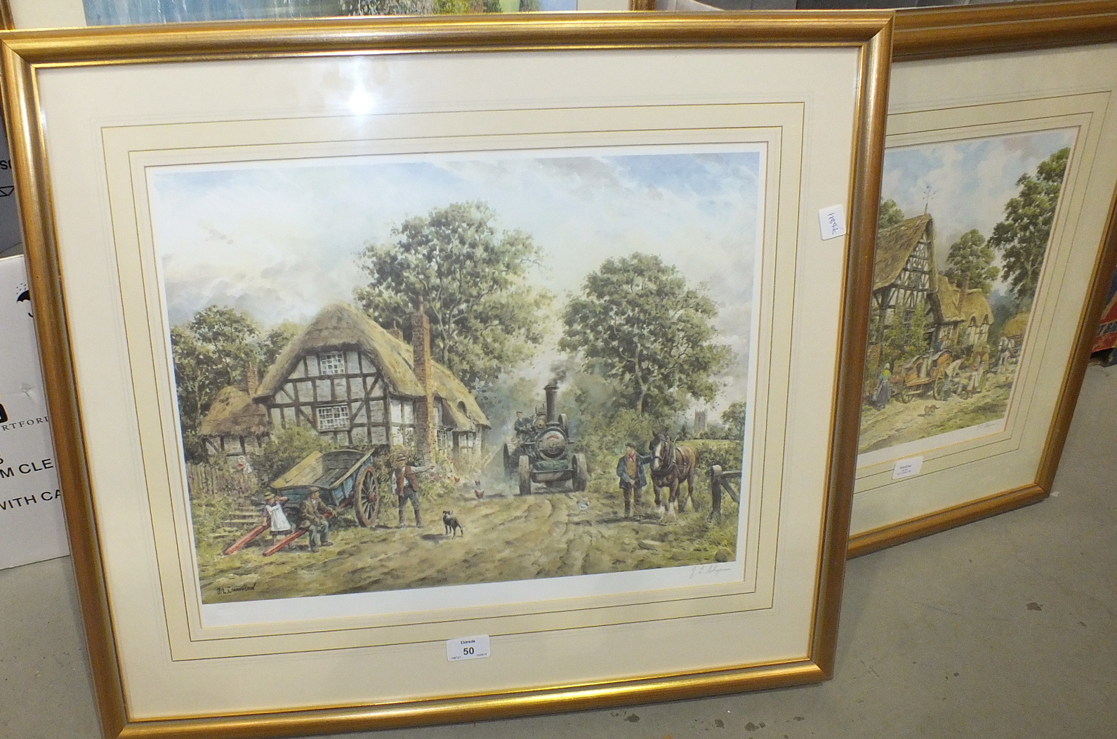 After J L Chapman, 'Figures outside cottage with traction engine approaching', a framed coloured - Image 2 of 3