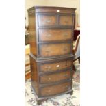 A reproduction walnut small chest of two short and five long drawers, on stand, 143cm high, 62cm