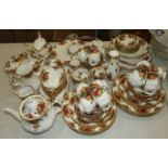 A quantity of Royal Albert 'Old Country Roses' dinner and tea ware, approximately 90 pieces.