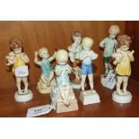 Seven Royal Worcester figurines designed by Florence Doughty: 'Sunshine Days', 9cm, (a/f), 'Woodland