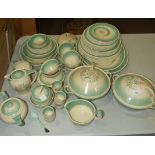 A collection of Susie Cooper 'Dresden Spray' decorated dinner and tea ware, 62 pieces, (some a/f).