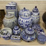 A quantity of reproduction blue and white Oriental ceramics, including ginger jars, large