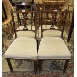 A set of four inlaid wood dining chairs with upholstered seat and turned front legs, (4).