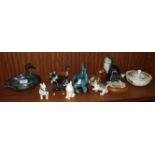 A pair of Poole Pottery Sea Lions, 10cm, a Beswick seated cat impressed '1030', 15.5cm high, a