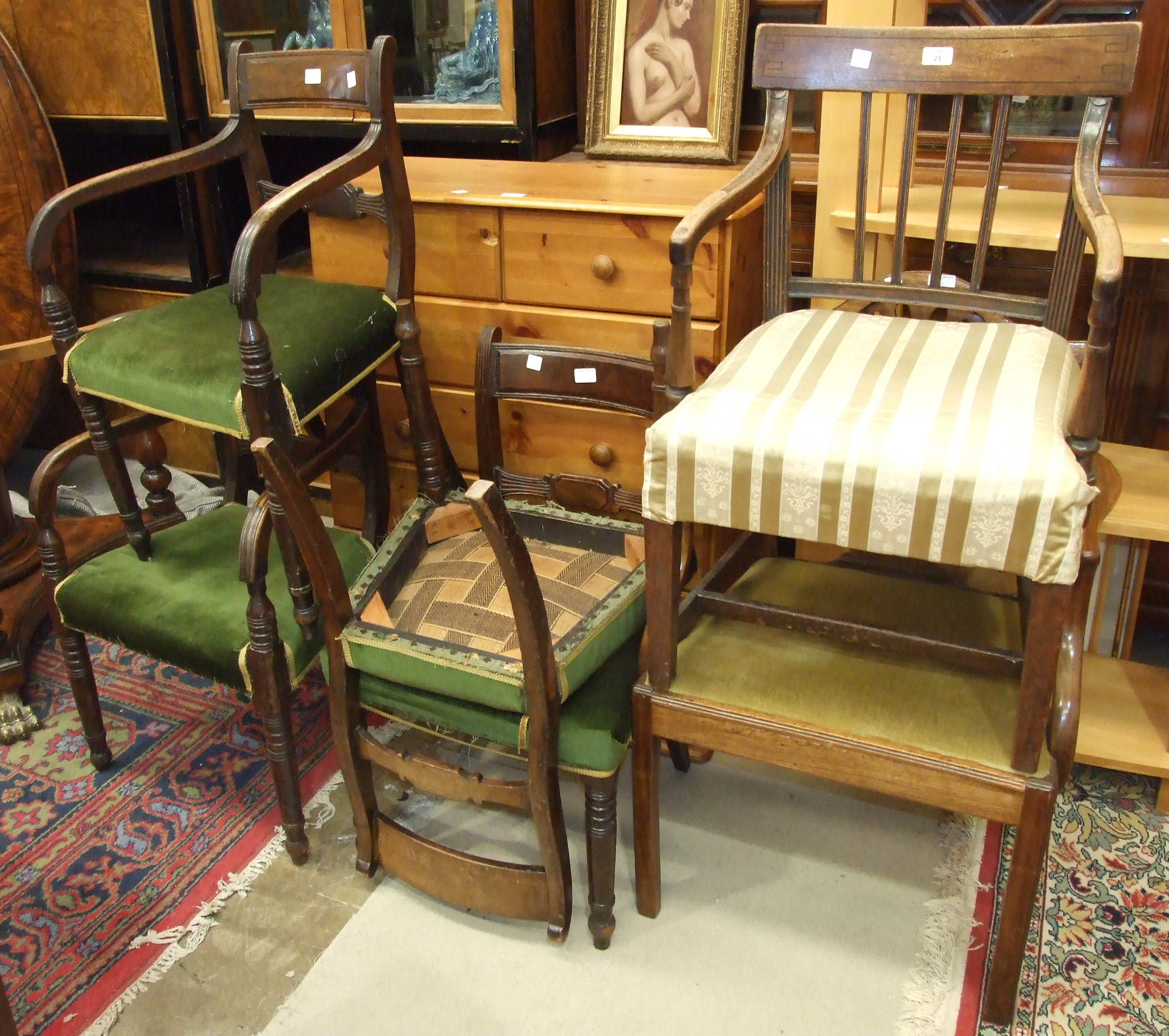 A Hepplewhite-style 19th century mahogany carver chair, a set of four Georgian mahogany dining