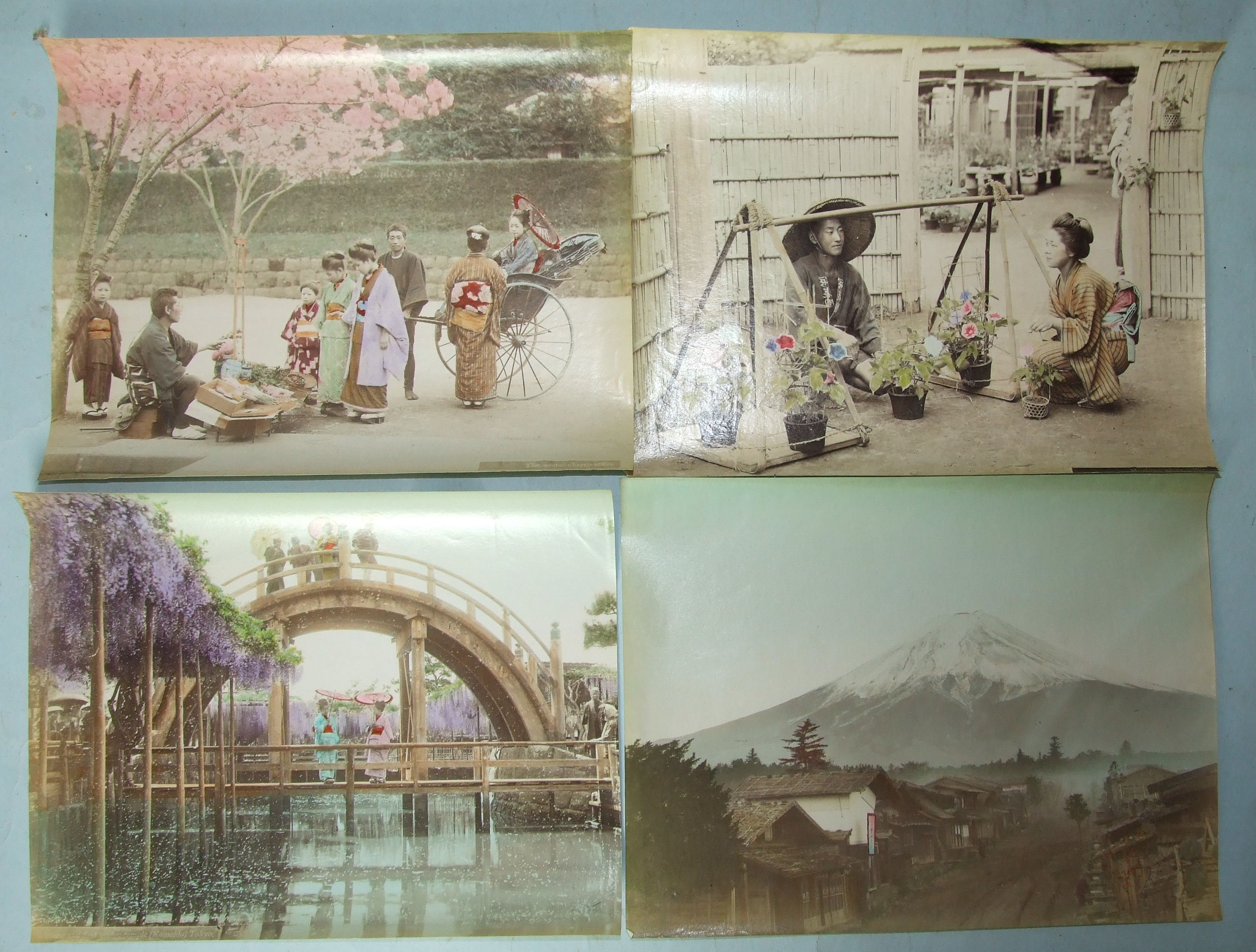 Fifteen hand-tinted Japanese photographs, 20 x 27cm, including views of Mount Fuji, Tokyo and