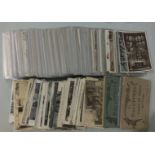 Approximately 560 loose postcards, mainly topographical, WWI damage in France, etc.